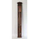 A 19TH CENTURY FRENCH MAHOGANY BAROMETER with three glass tubes, labelled Moreau. 42ins high.