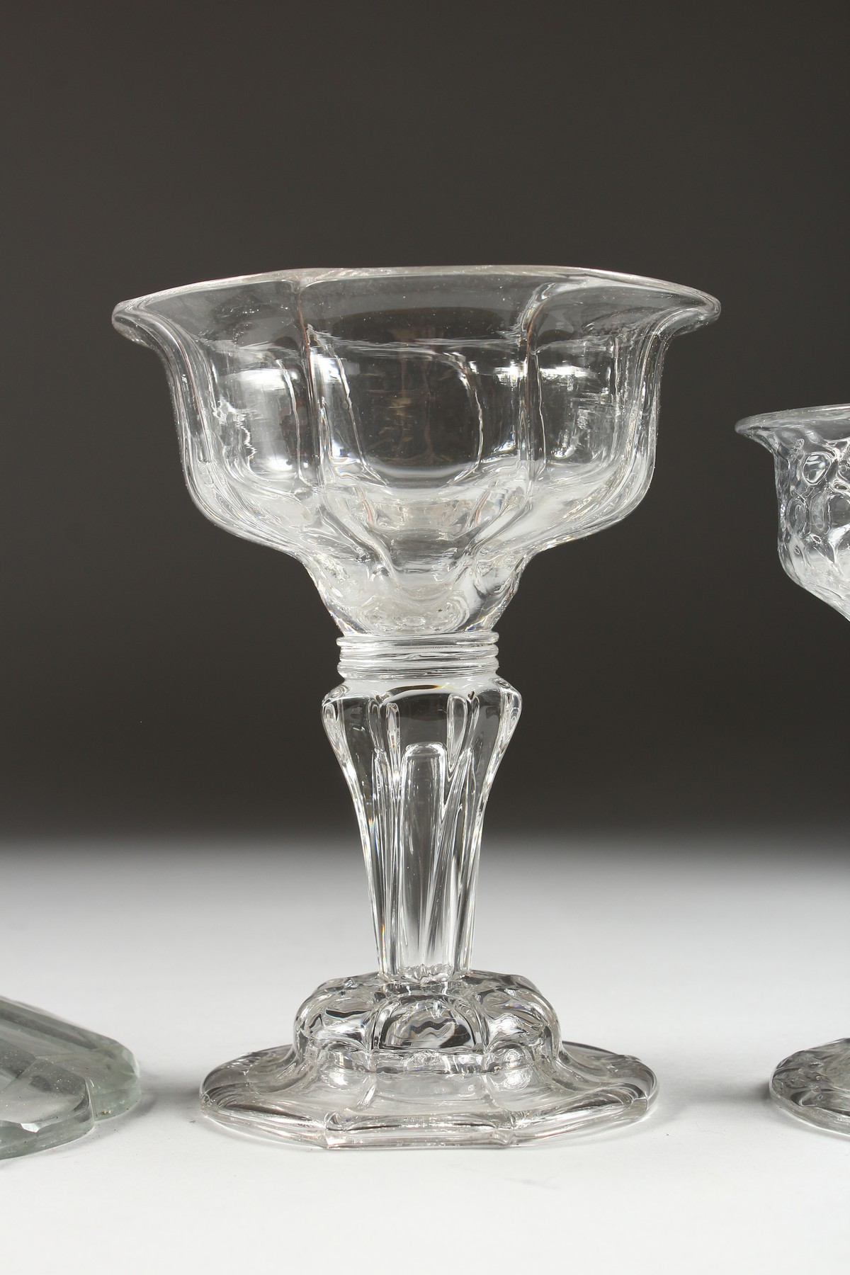 A GOOD 18TH/19TH CENTURY CUT GLASS CANDLESTICK; together with four 19th century cut and moulded - Image 5 of 6