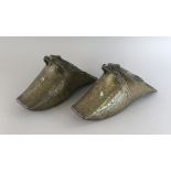 A PAIR OF 17TH CENTURY BRASS STIRRUPS.