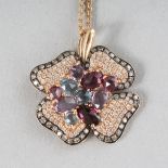 AN 18CT ROSE GOLD, SAPPHIRE (1.65cts) AND DIAMOND (0.69cts) FLOWER PENDANT on a chain.