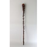 A ROOTWOOD WALKING STICK. 31ins long.