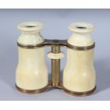 A GOOD PAIR OF MARINE IVORY OPERA GLASSES. 3.5ins, closed.