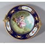 A GOOD SEVRES PORCELAIN PLATE, painted by E. FROGE, of young lovers. 10ins diameter, in an ormolu