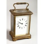 A 19TH CENTURY FRENCH BRASS TIMEPIECE. 4.5ins high.