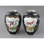 A PAIR OF BOOTHS POTTERY WORCESTER DESIGN VASES. 5ins high.