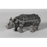 A BRONZE RHINO INKWELL. 6.5ins long.