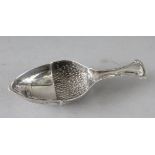 A SILVER ACORN CADDY SPOON. 3.25ins.