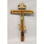 A LARGE RUSSIAN ORTHODOX PAINTED WOODEN DOUBLE SIDED THREE BAR CROSS. 3ft 9ins long.