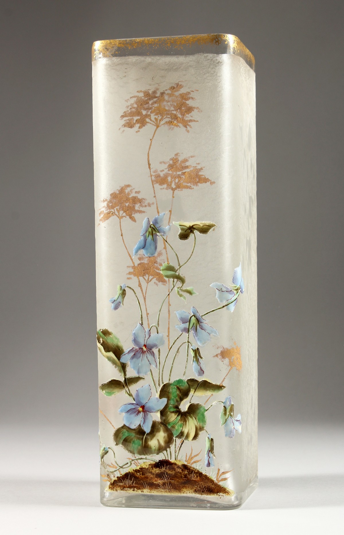 A FRENCH OPAQUE SQUARE SHAPED GLASS VASE painted with flowers. 11.75ins high.