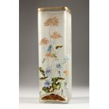 A FRENCH OPAQUE SQUARE SHAPED GLASS VASE painted with flowers. 11.75ins high.