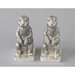 A PAIR OF CAST 800 RABBITS SALT AND PEPPERS. 2.25ins high.
