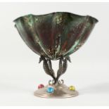 A CONTINENTAL SILVER AND ENAMEL PEDESTAL BOWL, with seahorse supports. 7ins high.
