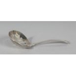 A GEORGE III PIERCED BOWL CADDY SPOON. London 1803.