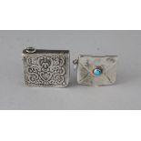 TWO SILVER STAMP CASES.