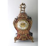 A GOOD LARGE 19TH CENTURY BOULLE MANTLE CLOCK, in an ebony case with brass inlay on tortoiseshell,