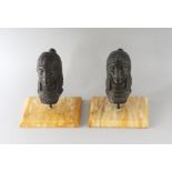 MAURICE FRECOURT A PAIR OF EGYPTIAN REVIVAL BUSTS on sienna marble bases.