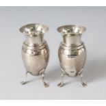 A PAIR OF VICTORIAN SILVER VASES, in a fitted case. London 1900.