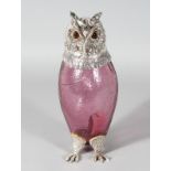 A GOOD PINK GLASS OWL CLARET JUG with plated head, collar and feet. 11ins high.