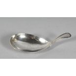 A GEORGE III OVAL BOWL CADDY SPOON. London 1795.