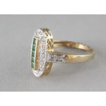 AN ART DECO DESIGN 9CT GOLD, EMERALD AND DIAMOND RING.