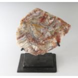 AN AGATE SLICE on a metal stand. 6ins.