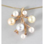 AN 18CT YELLOW GOLD, CULTURED PEARL AND PINK SAPPHIRE TREE PENDANT.