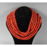 A SUPERB LARGE CORAL AND 18CT GOLD NECKLACE.