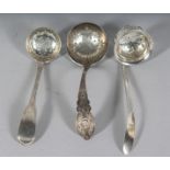 A GEORGE III FIDDLE THREAD SILVER SPOON, London 1803, and two others, Sheffield 1929 and 1926 (3).