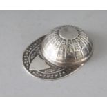 A SILVER JOCKEY CAP CADDY SPOON.