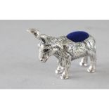 A SILVER DONKEY PIN CUSHION. 1.5ins.