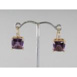 A GOOD PAIR OF 18CT GOLD, AMETHYST AND DIAMOND EARRINGS.