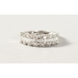 A VERY GOOD 18K WHITE GOLD BAGUETTE BAND RING.