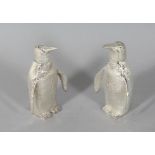 A PAIR OF SILVER PLATE PENGUIN SALT AND PEPPERS. 2.5ins high.