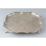 AN E.P.N.S. ENGRAVED PLATED SALVER. 12ins diameter.