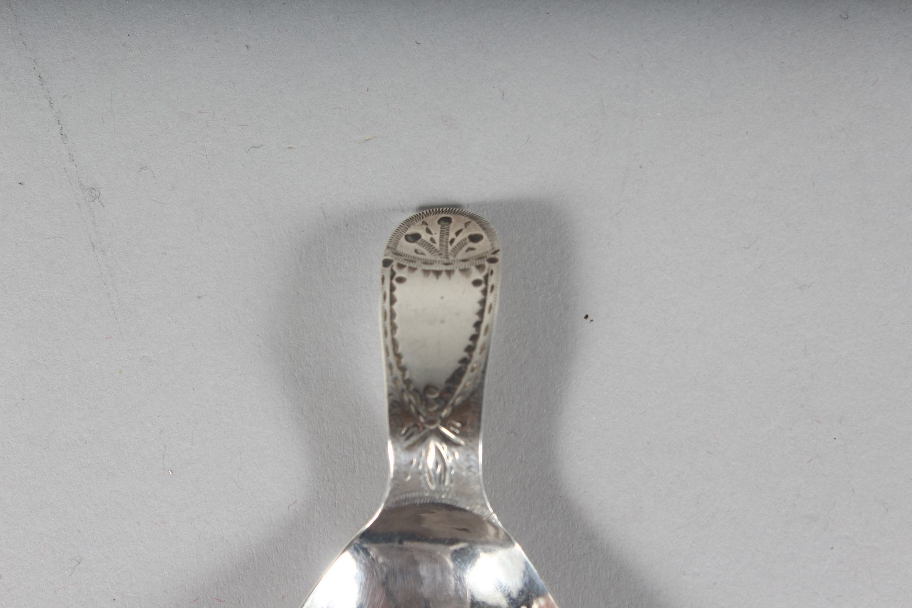 A GEORGE III BRIGHT CUT CADDY SPOON. London 1801. - Image 2 of 3