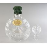 A BACCARAT CRYSTAL REMY MARTIN DECANTER AND STOPPER in a velvet box.