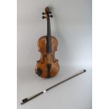 A CASED VIOLIN AND BOW in a case.