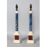 A FINE PAIR OF GRAND TOUR PIETRA DURA COLUMNS with Porphyry urn finials, on a black and white marble