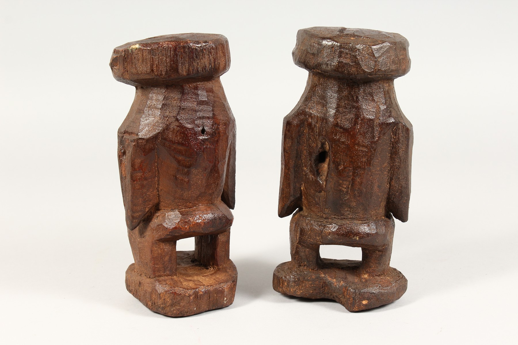 AN UNUSUAL PAIR OF TRIBAL CARVED WOOD STANDING FIGURES. 8ins high. - Image 4 of 4