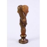 A GOOD 19TH CENTURY CHINESE CARVED RHINO HORN HANDLE SEAL, carved in the form of natural subject,