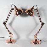 A GOOD PAIR OF COPPER ANGLEPOISE LAMPS.