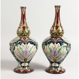 A GOOD PAIR OF ROYAL BONN OLD DUTCH VASES. 11ins high.