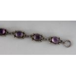 A SILVER AND AMETHYST BRACELET.