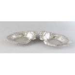 A PAIR OF STERLING SILVER LEAF AND VINE DISHES.