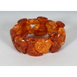 AN AMBER FLEXIBLE BRACELET.