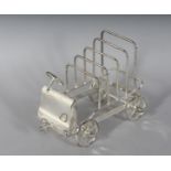 A VINTAGE CAR FOUR-DIVISION TOAST RACK. 6ins high.