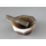 AN OCTAGONAL AGATE PESTLE AND MORTAR. 2.5ins.