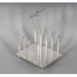 A PLAIN CHRISTOPHER DRESSER DESIGN TOAST RACK.