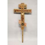 A LARGE RUSSIAN ORTHODOX PAINTED WOODEN DOUBLE SIDED THREE BAR CROSS. 4ft 9ins long.