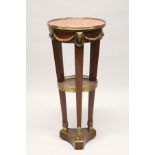 A GOOD LATE 19TH CENTURY MAHOGANY MARBLE AND ORMOLU GUERIDON, with a circular galleried rouge marble